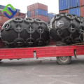 Deflated floating marine pneumatic fender